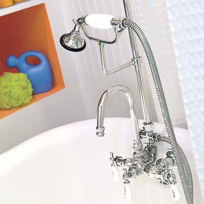 kid's bathroom close up of tub faucet and fittings