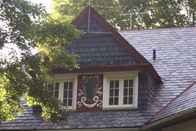 a dormer with Decorative Flourishes 