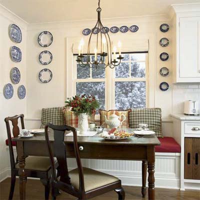a window seat and special niche in this remodeled shingle-style cottage