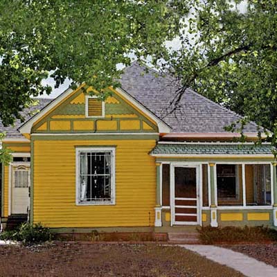 a Queen Anne with fish-scale-shingled gables and a wide front porch in Huning Highlands, Albuquerque, New Mexico