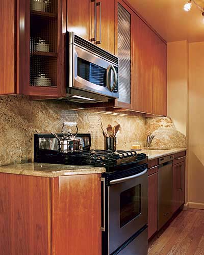 cherry kitchen cabinets, mocha granite, and red oak floors