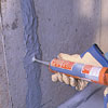 injecting epoxy into the crack