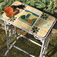 small outdoor table with top made of vintage tile