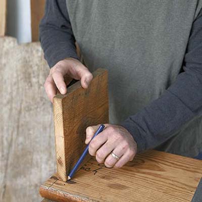 marking the board where you will screw the apron