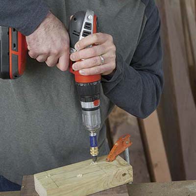 drilling screw holes in the blocking.
