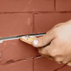 raking out bed joints in brick