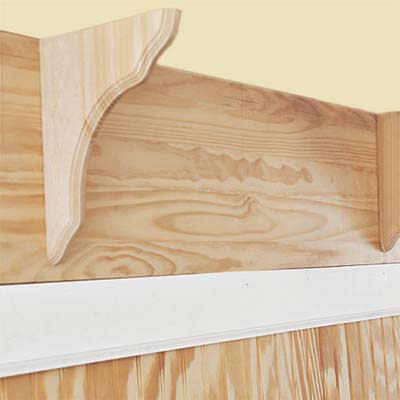 mounting the shelf brackets on the mudroom bench