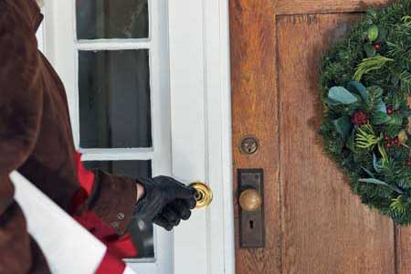 man approaching front door to ring the doorbell