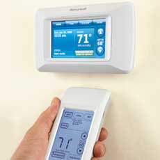 a programmable thermostat with a hand-held remote