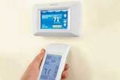 a programmable thermostat with a hand-held remote