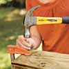 woman hammering nail