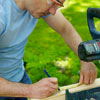 man marking kubb piece