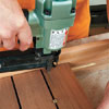 Mark Powers nailing the bottom boards to the tray area for a bar cart