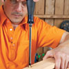 Mark Powers attaches the insert nuts for the sides of the bar cart