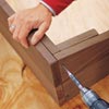 screwing the frame together with a drill/driver