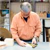 this old house general contractor marking  hole locations for the spacers while building a freestanding lamp