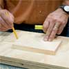 this old house general contractor attaching the ledge to the base and feet while building a freestanding lamp
