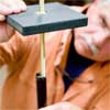 this old house general contractor assembling the pieces to build a freestanding lamp