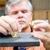 this old house general contractor threading the collar to build a freestanding lamp