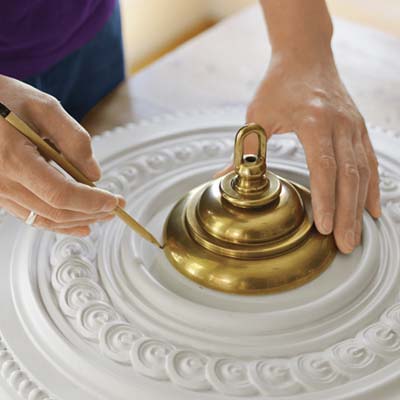 mark the ceiling medallion for cutting with a pencil