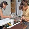 priming and painting the shutters and allowing them to dry
