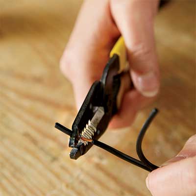 prep the wires to rewire an all-weather lantern