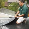 covering the roof with a waterproofing membrane