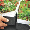 connecting planted trays on the roof using a modular plastic lip system