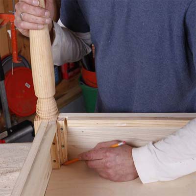 marking out the size of the table for assembly while building a display coffee table