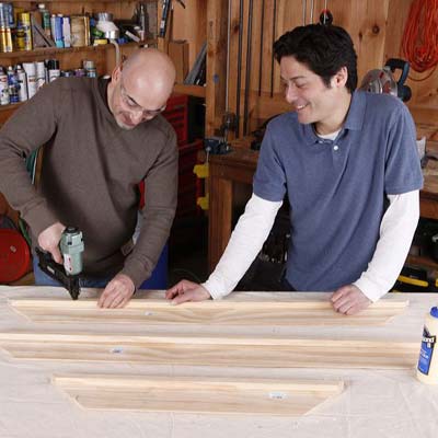 attach the lip pieces to the frame pieces while building a display coffee table