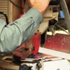 tom silva and reader cutting molding strips for magazine file