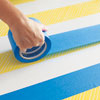taping over the first set of stripes for the second coat