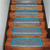 padding adhered with double sided carpet tape  for this easy to install stair runner