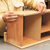 Tom Silva attaches molding to trim the hutch