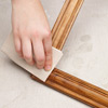 Sanding the wood frame