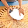 attach the mirror when making a sunburst mirror frame with wood shims