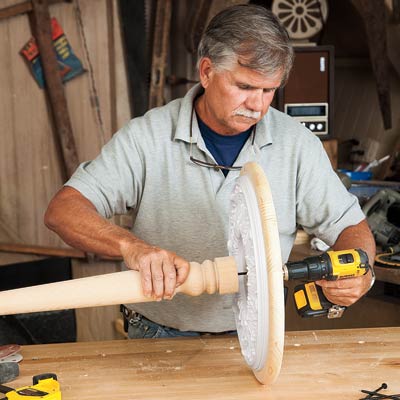 glue base of table to wood pedestal