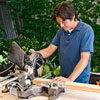 cutting a 2x4 with a compound miter saw