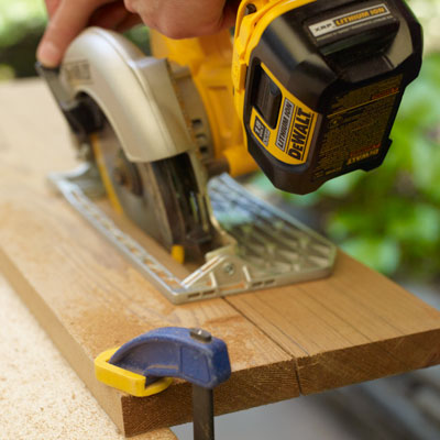 cutting a board for the front leg of a Westport chair with a circular saw