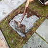 filling setting bed for paver with stone dust for a stable base in stone stepping path 