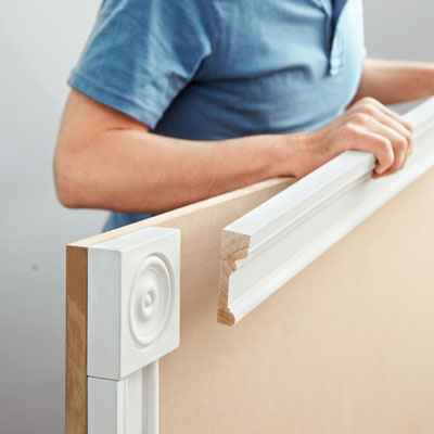 attaching the headboard trim for a storage bed
