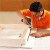 Attach the Drawer to the Bed Frame to build a murphy bed for your dog