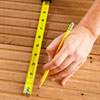 measuring tongue-in-groove flooring to use as recessed shelving