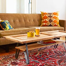 a finished coffee table made from a salvaged cabinet door