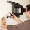 cutting receptacle hole in drywall for hanging a flat-screen tv 