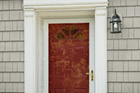 a front door with a storm door
