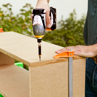 assembling the parts for a columned room divider