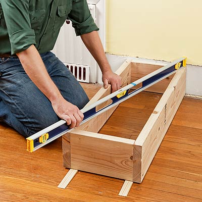 making sure the base is level for a columned room divider