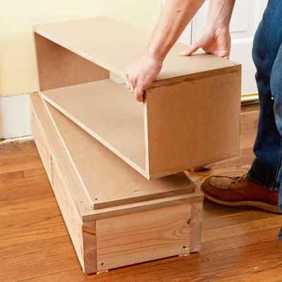 stacking the boxes for a columned room divider