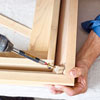 attaching reinforcing block to an outside miter for kitchen cabinet crown molding